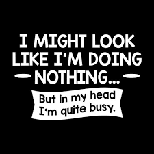 Funny T-Shirts design "I might Look Like I'm Doing Nothing But In my Head I'm Quite Busy"